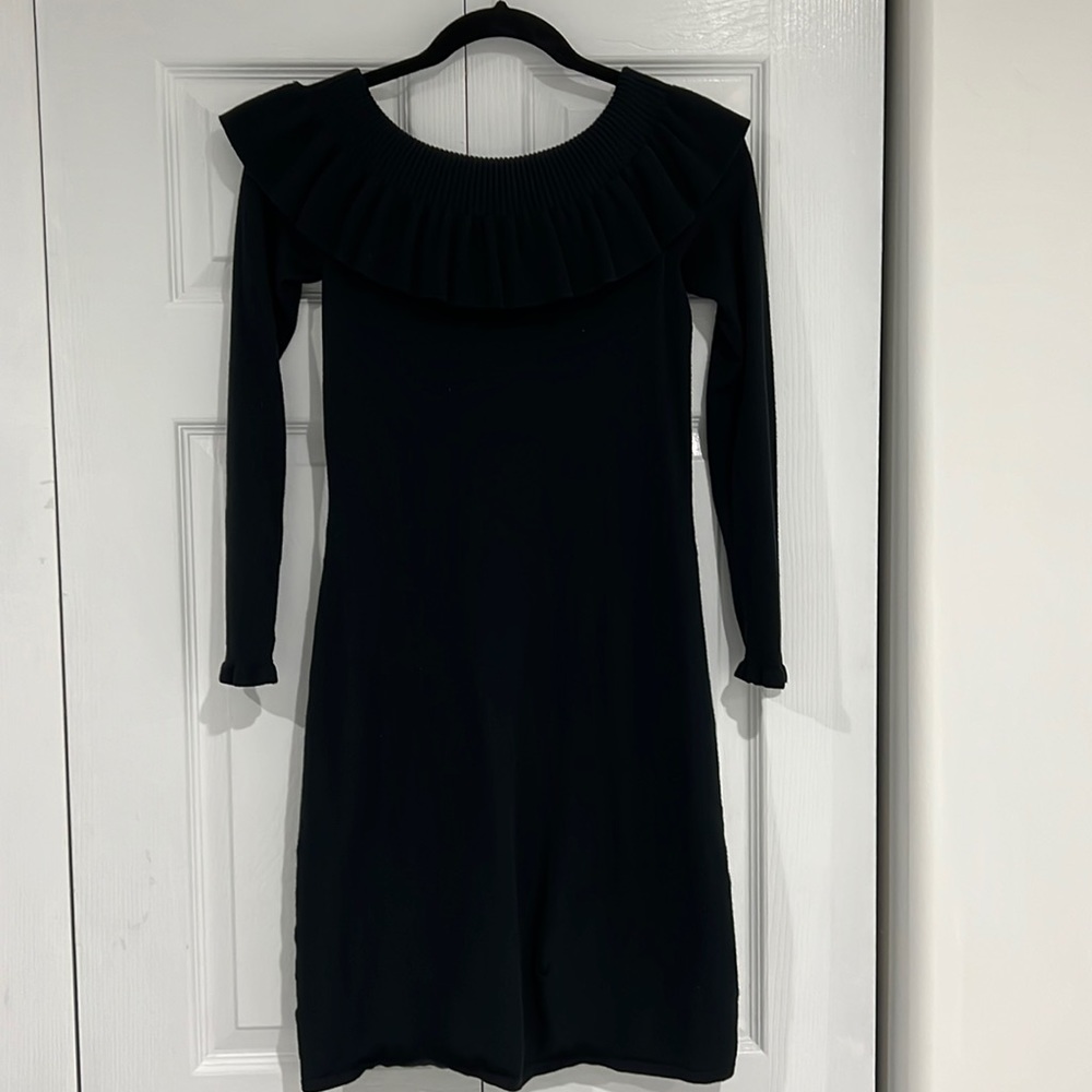 Black sweater dress can be worn on and off the shoulders by Lilly Pulitzer.